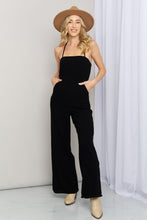 Load image into Gallery viewer, Full Size Halter Neck Wide Leg Jumpsuit with Pockets | iModel Apparel